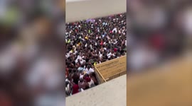 Notting Hill Carnival crowds seen screaming and forced to climb over gates as thousands packed into one road with no space