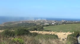A fire at Glebe cliff, Tintagel in North Cornwall  is still smouldering a day after 3