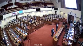 MP punches colleague in the FACE during parliament session in Chile