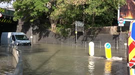 Burst water main leaves van stranded in underpass in Wealdstone, London