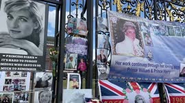 Pictures, posters and flowers outside London's Kensington Gardens for Princess Diana