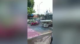 Truck crash kills at least 11 at bus stop near school in Indonesia