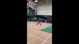 'Basketball enthusiast shows off his tremendous skills in half-time shot contest 
'