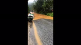 The driver tried to drive through the flood water but failed