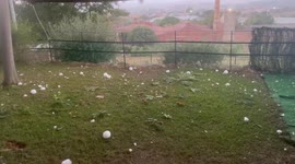 Spanish garden filled with tennis ball-sized hail