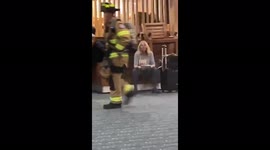 Firefighters arrive at Orlando International Airport, US, as smoke fills terminals
