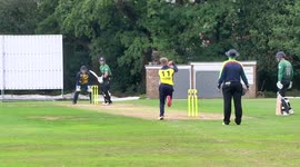 Cricket player smashes ball for six straight through clubhouse window sending spectators diving out of the way