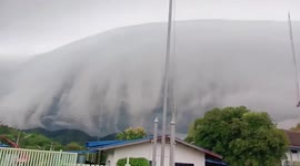 Giant mass of clouds blanket mountain in Thailand
