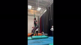 Circus performer's trousers rips open after getting stuck in trapeze during practice