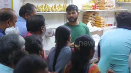 Large queues of devotees wait to buy Lord Ganesha's favourite sweets in Mumbai, India
