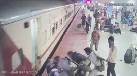 Police save ticket inspector from moving train in India
