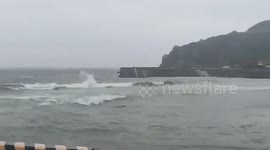 Rough waves batter coast as Typhoon Hinnamnor approaches northern Philippines