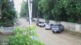 Residents hide in temple as wild elephant runs through village road in Thailand