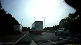 Terrifying crash as BMW side-swiped by lorry and spun across 3 lanes of the A12 in Essex, UK