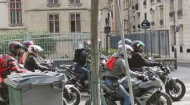 Bikers rally against the introduction of paid parking for motorbikes in Paris, France