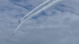 Beach spectators enjoy sight of Lancaster bomber and stunning Red Arrows display at Bournemouth Air Festival