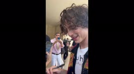 Actor Timothee Chalamet signs autographs at Venice Film Festival in Italy