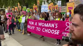 Pro-choice and anti-abortion protesters clash in Parliament Square.