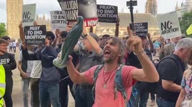 Pro and anti-abortion protesters clash as rival rallies held in London's Parliament Square