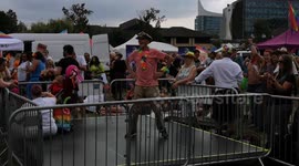 An elderly man busts some dance moves at Reading Pride