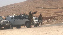 Israeli troops close roads around Tamon village after shooting attack on an Israeli bus