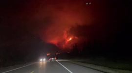 Driving through inferno as wildfire grows to 1,500 hectares in Jasper National Park, Canada