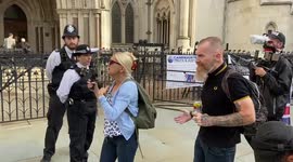 Pro-refugee protesters scuffle with far-right counter-protesters oustide Royal Courts of Justice