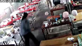 Terrified noodle shop diners flee to safety as storm gusts batter restaurant in Thailand