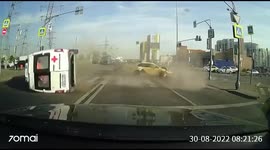 Taxi crashes into ambulance with sirens on at intersection in Moscow