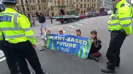 Animal Rights protesters glue themselves outside Tory leadership