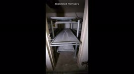 Exploring creepy abandoned mortuary filled with body trays at night