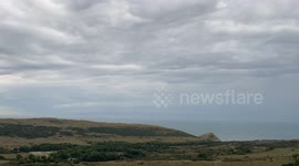 UFO looking thunderstorm shelf cloud rolling in off the sea in Dorset