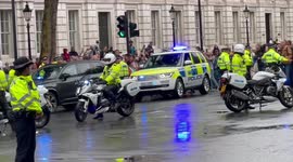New UK Prime Minister Liz Truss’s car convoy decides against entering Downing Street’s front gates and diverts to the back instead