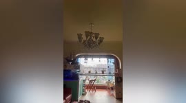 Chandelier sways as 6.8 magnitude earthquake shakes apartment in China