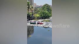 Family rides tractor through raging floods in 'India’s Silicon Valley’ Bengaluru