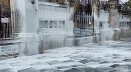 Palace of Westminster covered with white paint by activists