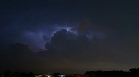 Stunning time-lapse footage captures a lightning storm swirling in dark clouds over Montpellier in France