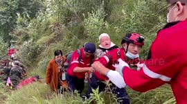 Chinese rescuers walk 8 hours to transfer trapped residents after earthquake