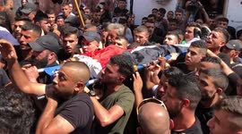 Palestinians attend the funeral of Younes Tayeh who was killed by Isareli forces during a military raid in the refugee camp of al-Fara'a, south of the West Bank city of Tubas