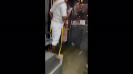 Flooded bus drives around Bangalore after heavy rains hit city