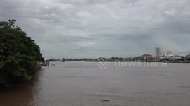 Bangkok river reaches dangerously high levels following heavy monsoon season rain