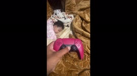 Sleeping wife hilariously wakes up immediately after her husband turns on the PS5