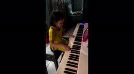6 year old girl from Indonesia masterfully plays the piano!