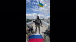 Ukrainian soldier announces liberation of Balakliya as he stamps on Russian flag