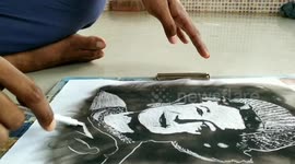 Indian artist uses fire and smoke to create tribute to Queen Elizabeth II