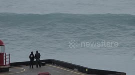 World class surfer catches HUGE wave in Nazare, Portugal