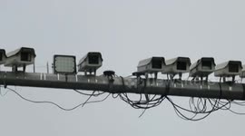 Twenty surveillance cameras on one pole in China