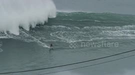 British surfer Andrew Cotton rides MONSTER wave in Portugal