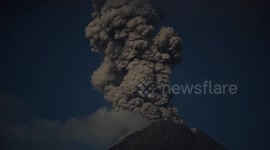 Lightning strikes as ash pours from from Colima Volcano, Mexico