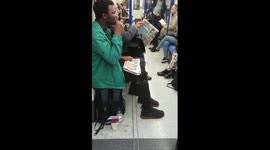 Man BRUSHES TEETH on London Underground train